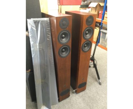 A boxed pair of PMC Fact 8 tower speakers. Speaker grilles supplied.