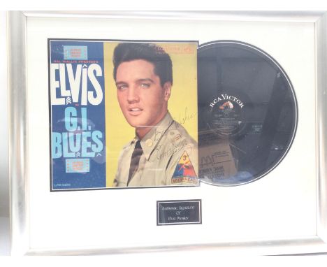 A framed and glazed copy of 'G.I. Blues' by Elvis Presley with signature of the artist. COA included.