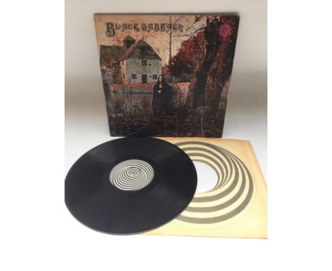 A first UK pressing of the self titled debut from Black Sabbath. Vinyl Ex.