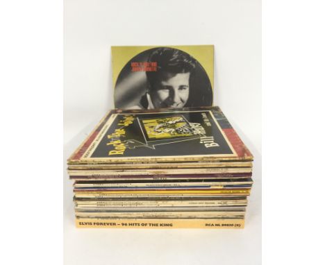 A collection of rock n roll and rockabilly LPs by various artists including Johnny Burnette, Elvis Presley, Little Richard an