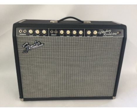 A Fender Vibrolux reverb amplifier, type CSR8. Comes supplied with footswitch and original Fender branded amp cover.