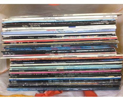 A collection of LPs by artists mainly from the 1980s including The Style Council, Bryan Ferry, Michael Jackson, Level 42 and 