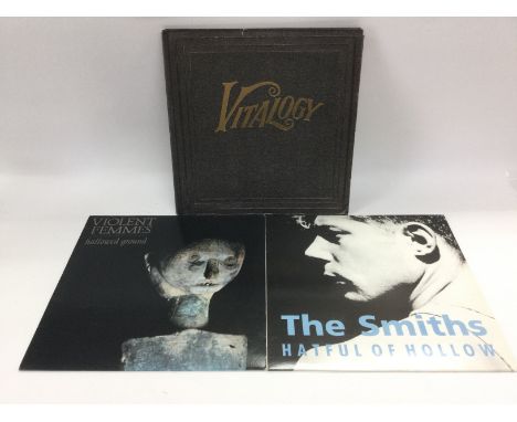 Three alternative rock LPs comprising 'Vitalogy' by Pearl Jam, 'Hatful Of Hollow' by The Smiths and 'Hallowed Ground' by Viol
