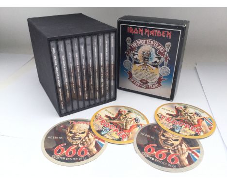 A rare Iron Maiden 'The First Ten Tears' 10CD box set plus four Iron Maiden beermats.