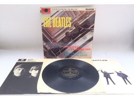 A first UK mono pressing of The Beatles debut LP 'Please Please Me', PMC 1202 with black and gold Parlophone labels. Vinyl Ex