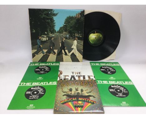 A collection of Beatles LPs, EPs and 7inch including a first UK pressing of 'Abbey Road', 'Magical Mystery Tour' EP (missing 