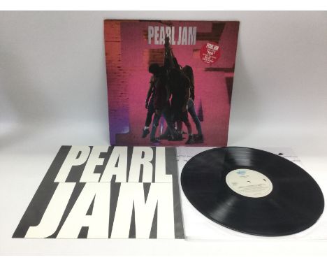 An early pressing of 'Ten' by Pearl Jam. VG+.