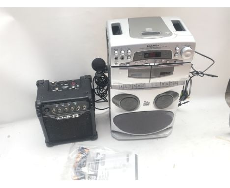 An SMG-209 Karaoke machine and a line 6 Micro Spider amplifier (2).