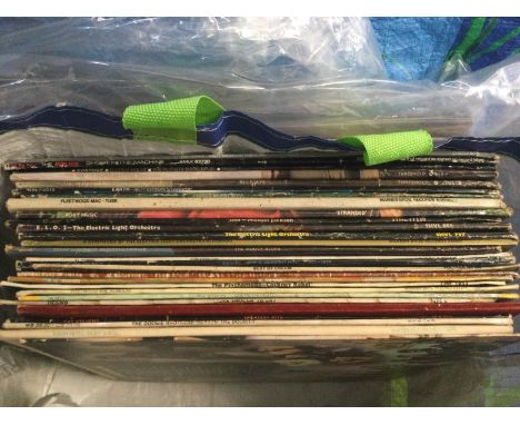 A bag of LPs by various artists including Cream, The Moody Blues, Michael Jackson and others