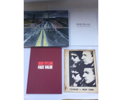 A rare catalogue and a hardback book of the Bob Dylan exhibition 'The Beaten Path' which ran from 5/11/16 to 11/12/16 at The 