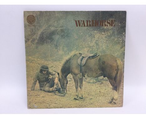 A first UK pressing of the self titled Warhorse LP, 6360 015, complete with Vertigo inner sleeve. Small feelable scratch on s