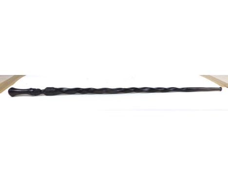 Tribal Art: a Zulu dark hardwood walking stick with a maidens head and twist decoration 