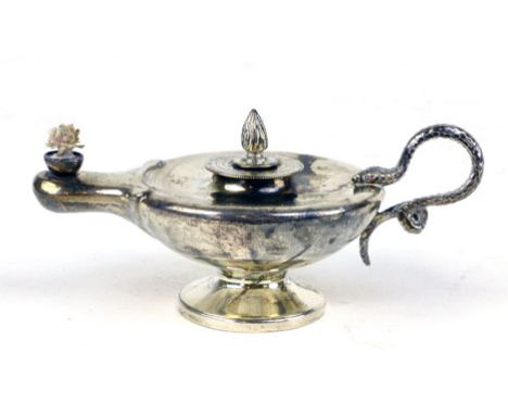 A silver table lighter in the form of a Roman oil lamp with snake handle and flame lighter, makers Rupert Favell, London, 189