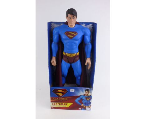 A boxed figure modelled as Superman by Mattel, h. 75 cm 