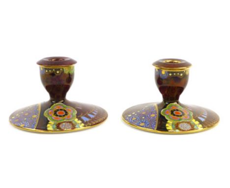 A pair of Carltonware 'Rouge Royale Harebell' candlesticks, each enamelled in the pattern, with printed and painted marks, d.