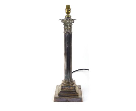 A silver plated lamp base in the form of ionic column, h. 50 cm (incl. fittings)