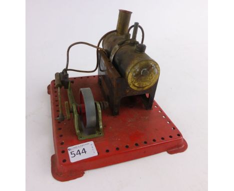 A Mamod live steam stationary engine on a red rectangular base, l. 21 cm (base) CONDITION REPORT: Not pressure tested
