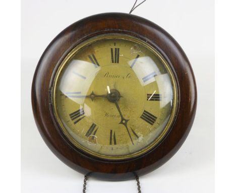A mahogany framed wall clock, the cream painted dial inscribed C Reiner & Co Worcester, on a twin train movement, d. 30 cm CO