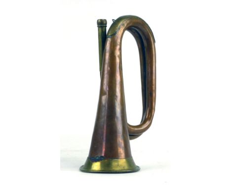 A copper and brass military style bugle marked 'Inter Service' to the top, l. 27.9