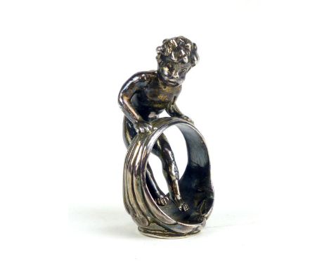 A silver seal modelled as a child climbing on an oversized signet ring, Chester, Import marks, date mark rubbed, weight 50 gr
