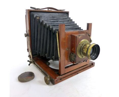 'The Swift', a mahogany and brass mounted plate camera and lenses  CONDITION REPORT: No warranties offered to working conditi