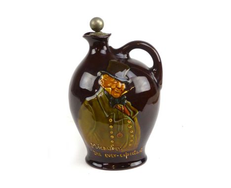 A Royal Doulton Kingsware Dewars whisky flagon and stopper, decorated with a portrait of Micawber, with printed marks to base
