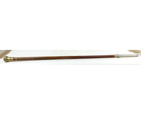 A 19th century bandmasters stick with bamboo shaft and rounded brass head