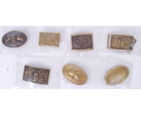 BUCKLES: A collection of 20th century reproduction / replica US Army Civil War uniform belt buckles. Each in brass, each with