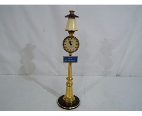 A vintage Jaeger Rue De La Piax street lamp clock, approximately 28 cm [h] Est £100 - £200. 