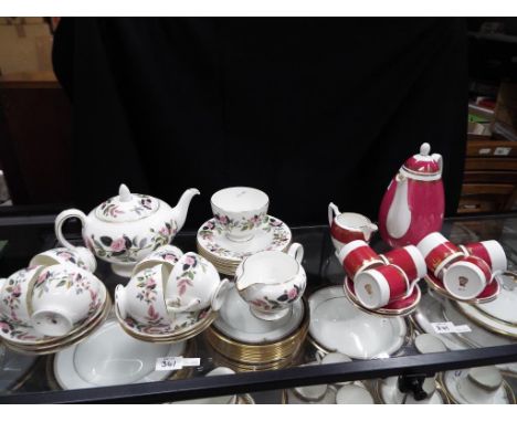 A lot to include a Wedgwood Hathaway Rose tea set comprising tea pot, sugar bowl, creamer, cups, saucers and plates - an exam