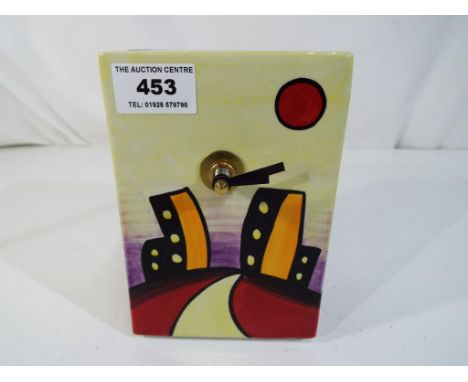 Lorna Bailey - a Lorna Bailey ceramic mantle clock decorated in the Manhattan  pattern, Est £20 - £40