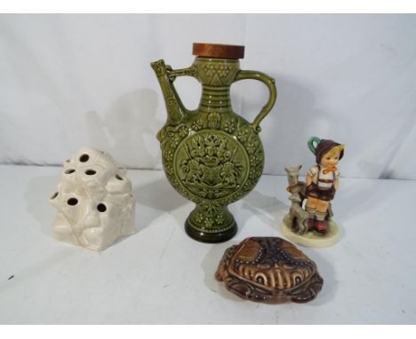 A lot to include a Clarice Cliff Newport pottery posy holder in the form of a rock, marked 225 to the base, a Hummel figurine