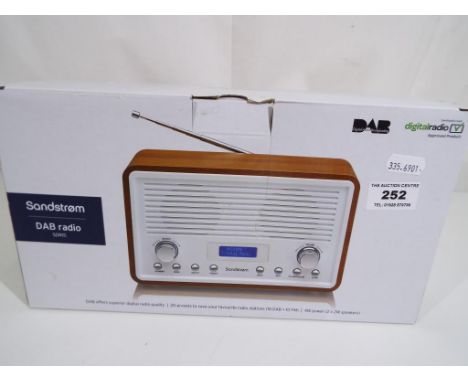 A Sandstrom DAB radio model no. SDR15, appears unused in original packaging.