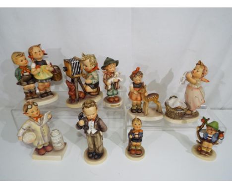 Nine ceramic Hummel figurines by Goebel (qty)