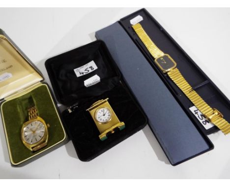 A Montine 25 jewel incabloc wristwatch with a rolled gold gate bracelet / strap, an Avia wristwatch and a miniature mantel cl