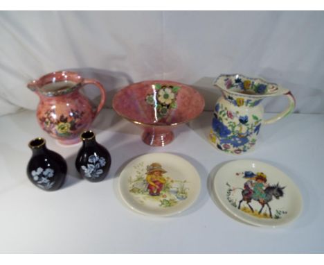 A lot to include a pair of Wade vases with floral decoration on a black ground, Mason's ironstone Regency pattern jug, Royal 