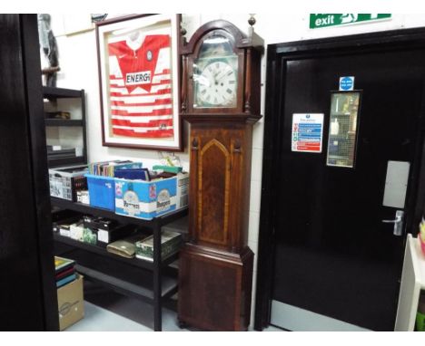 An unusual early 19th century 8-day longcase clock, the mahogany case having Gothic and Scottish styling influences, arched t