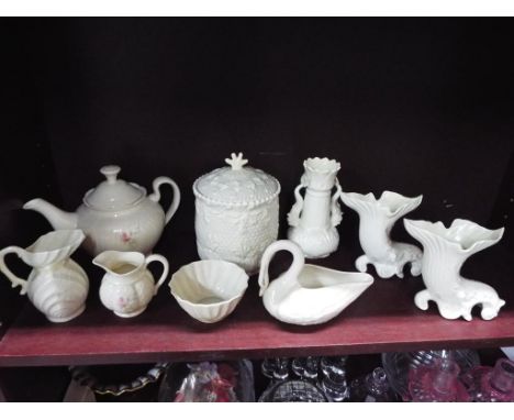 A quantity of Belleek and Irish Papian ceramics to include teapot, vases, jugs and similar.