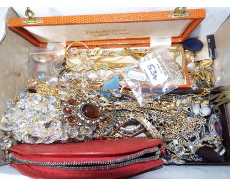 A good mixed lot of predominantly vintage costume jewellery to include necklaces, paired earrings, brooches and similar, also