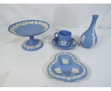 Wedgwood - five pieces of light blue Wedgwood jasper ware, to include small tazza, small vase, coffe can and saucer and a pin