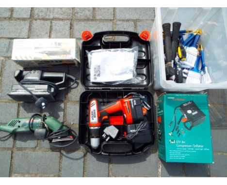 A lot to include a cased Black and Decker power drill, Five in One 12v air compressor / inflator in original box, cordless po