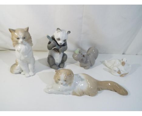 Nao - five Nao ceramic figurines, depicting animals, to include Panda, Hippo with Frog, two Cat models and similar, largest a