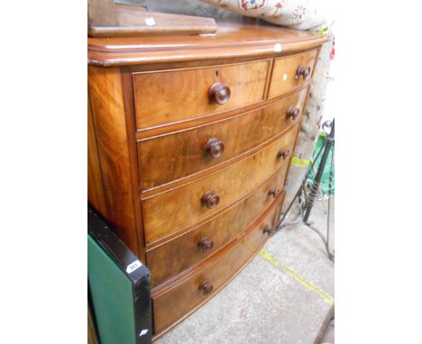 A 1.2m early Victorian mahogany bow front chest of two short and four long graduated drawers, set on turned feet