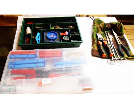 Two plastic partitioned cases containing coarse fishing tackle including weights, prepared traced hooks, small bait feeders, 