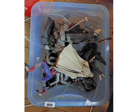 A crate containing a quantity of Lord of the Rings and Marvel comics, action figures including Spiderman, Daredevil, Gandalf,