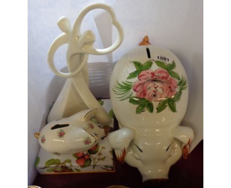 A small selection of ceramic items comprising large piggy bank, smaller similar, Enesco Love figurine and boxed set of Portme