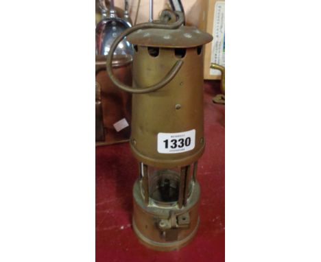 An old brass miner's safety lamp - plaque missing