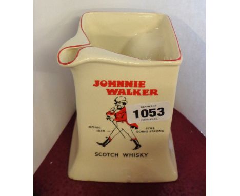 A vintage Wade Regicor pub water jug advertising Johnnie Walker Scotch Whisky