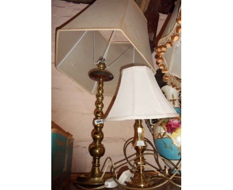 A large antique table candlestick of bobbin turned form - converted to an electric table lamp - sold with a smaller modern si