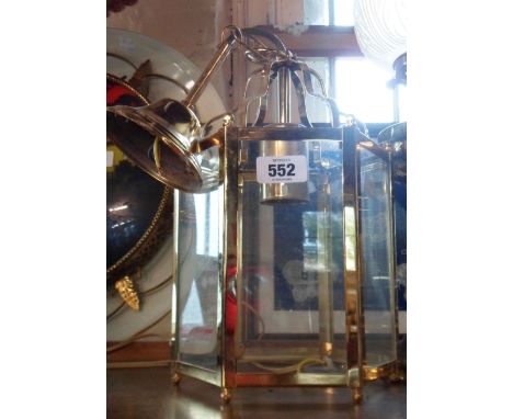 A modern brass framed hanging hall lantern